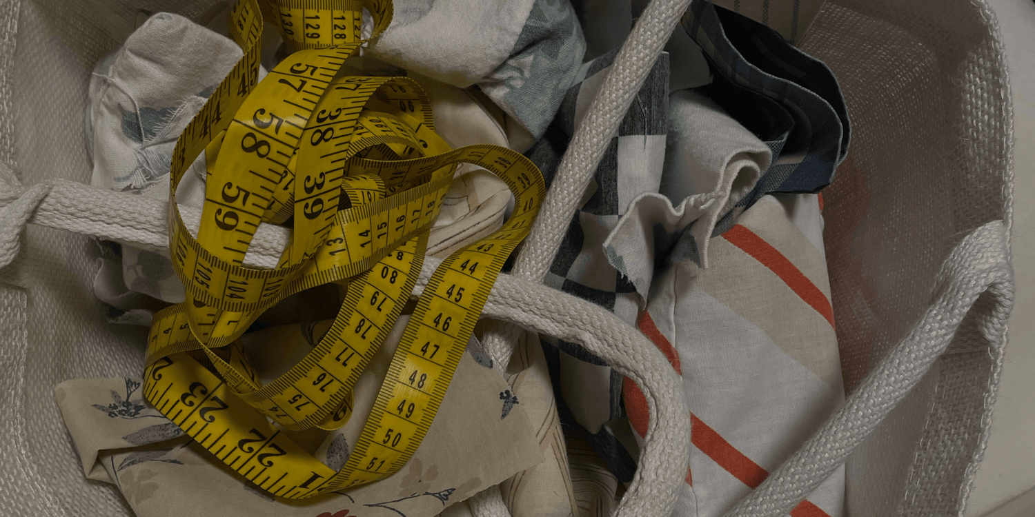 yellow fabric tape measure in a handbag