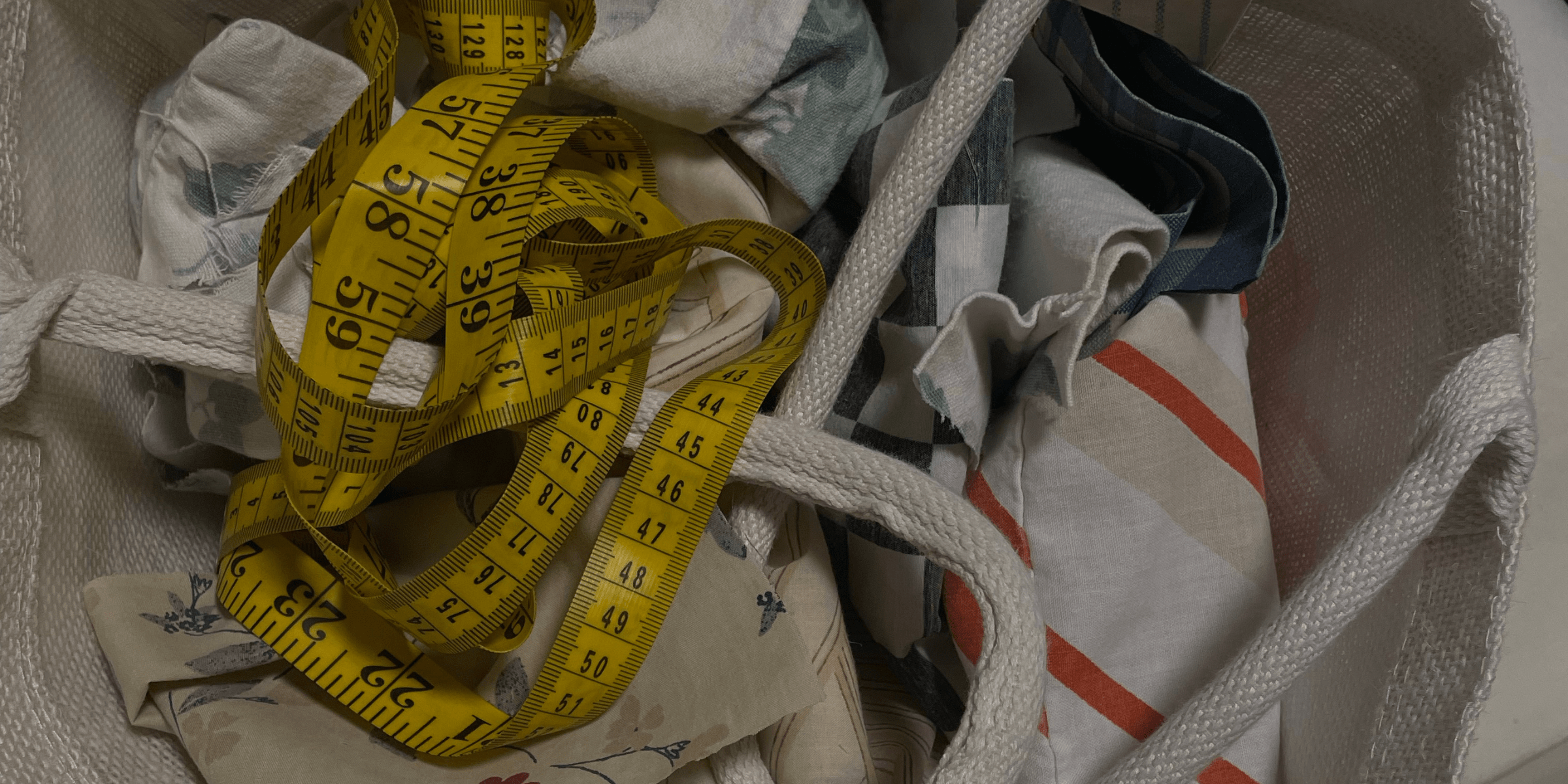 yellow fabric tape measure in a handbag