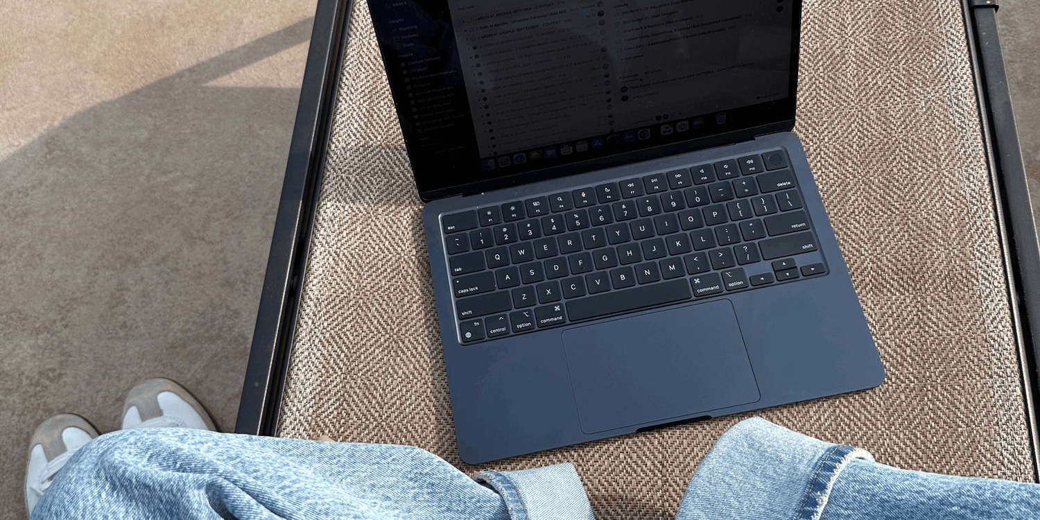 black laptop browsing minimalist