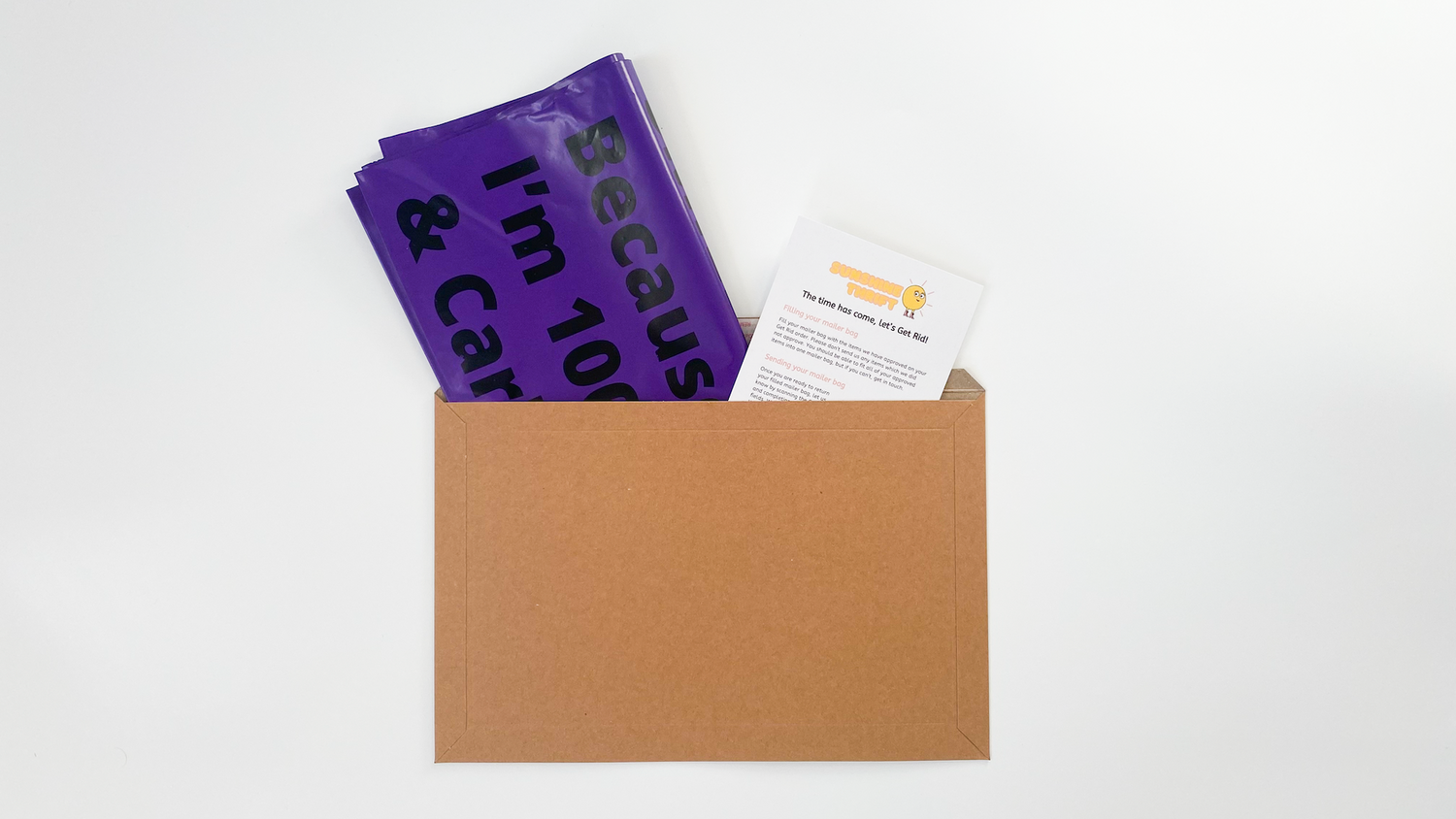 Purple mailer bag folded into a cardboard envelope with an information card.